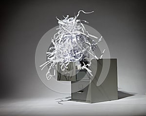 Filing Cabinet and Shredded Paper