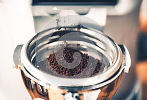 Filing Portafilter with Coffee photo