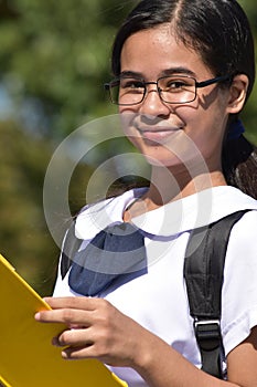 A Filipina Girl Student Reading