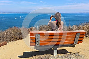 Filipino American Woman Taking Photo at Cabrillo Monument Bayside Trail photo