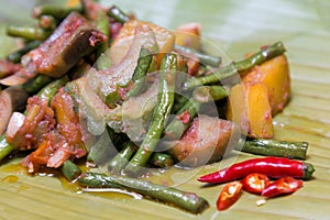 Filipino authentic traditional dish: philippine pork ginataan with rice and egg