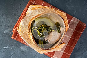 Filipino chicken coconut soup also known as chicken binakol