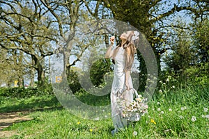 Filipino model in a rapeseed field in the springtime