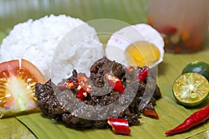 Filipino traditional authentic dish: philippine spicy beaf tapa with egg and rice