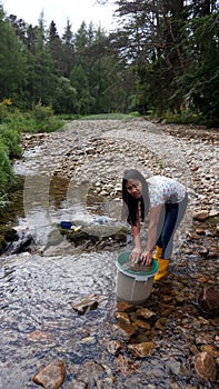 Filipino Woman Panning For Gold