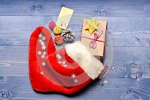 Fill sock with gifts or presents. Celebrate christmas. Contents of christmas stocking. Small items stocking stuffers or