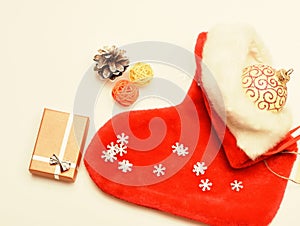Fill sock with gifts or presents. Contents of christmas stocking. Christmas celebration. Christmas sock white background