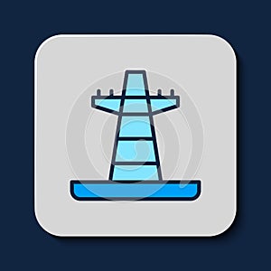 Filled outline Electric tower used to support an overhead power line icon isolated on blue background. High voltage