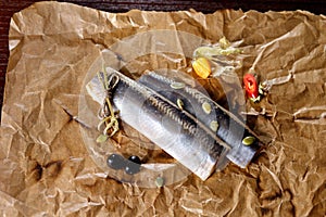 Fillet of Atlantic herring on paper. The view from the top.