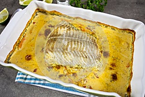 Fillet of coalfish cooked in the oven with sauce