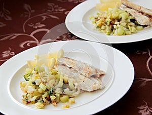 Fillet of codfish served with grilled vegetable - fennel, bok choy and celery.