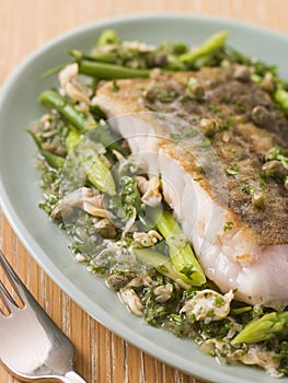 Fillet of Hake with Cockles Green Vegetables photo