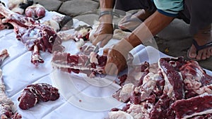 fillet process. chopping meat of sacrifice or qurban in Eid Al Adha. Selective focus.