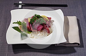 Fillets of bluefin tuna on a bed of white rice