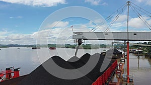 Filling barges with coal on port Aerial View