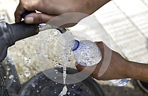 Filling bottle in fountain