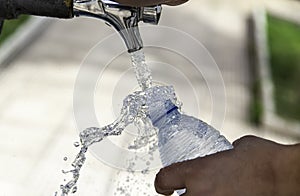 Filling bottle in fountain