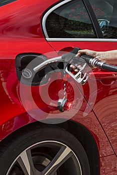 Filling a car with fuel - Pumping Gas