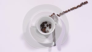 Filling cup with coffee beans