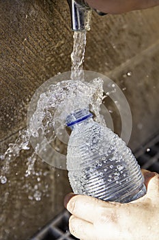 Filling water bottle
