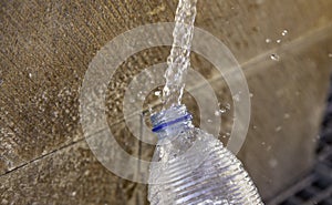 Filling water bottle