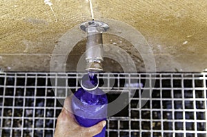 Filling water bottle