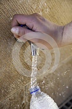 Filling water bottle