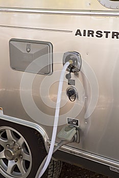 Filling the water tank of a campervan