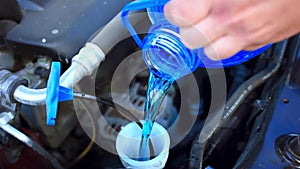 Filling windshield washer fluid