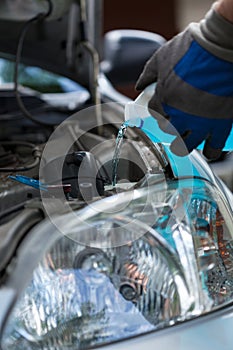 Filling windshield washer fluid