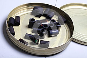 Film archive negatives in a round metal can