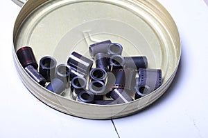 Film archive negatives in a round metal can