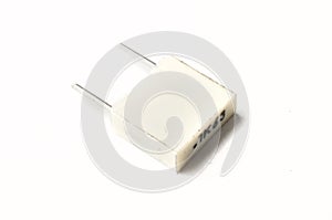 Film capacitor on white background