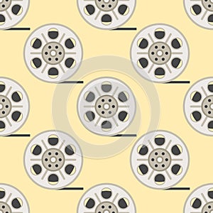 Film cinema technology seamless pattern vector twisted movie strip with round box roll illustration