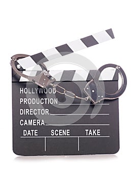 Film clapper with handcuffs