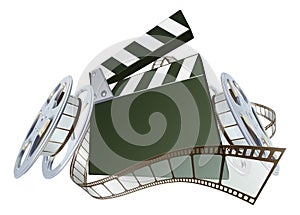 Film clapperboard and movie film reels photo