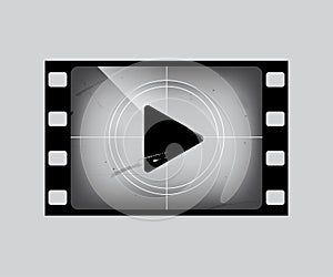 Film frame with play simbol on grey. Vector grunge film strip part.