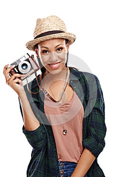 Film is my favourite. Portrait of an attractive young woman with a retro camera isolated on white.