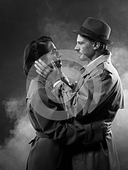 Film noir: romantic couple embracing