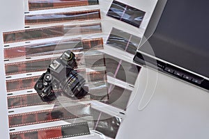 Film photography and scanning photo negatives using a scanner. Film camera with films negative various formats.