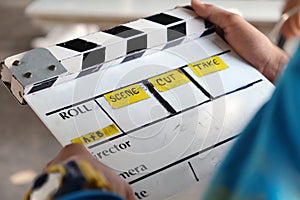 Film production crew, close up of movie Clapper board