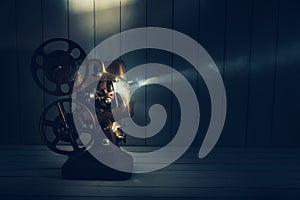 Film projector with dramatic lighting