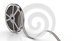 Film reel bobbin spinning on the white background with empty copyspace