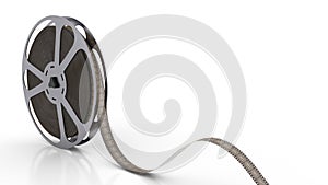 Film reel bobbin spinning on the white background with empty copyspace