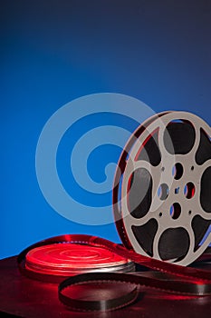 Film reel with movie film - space for text