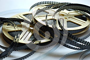 Film reels on white background