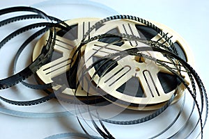 Film reels on white background