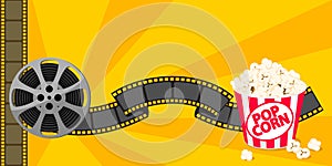 Film strip border with popcorn isolated on background.