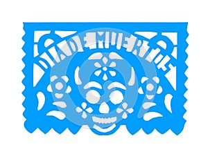 A Mexican perforated paper or pecked paper, with a skull head with the text in Spanish day of the dead. photo