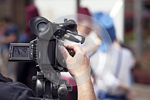 Filming an event with a video camera